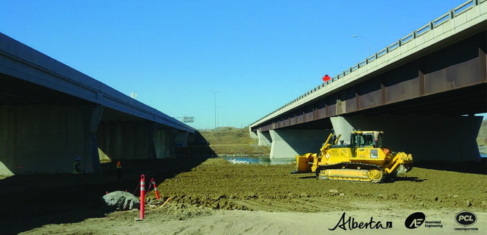 Pre-demolition – Looking west over Bow River from ground level.