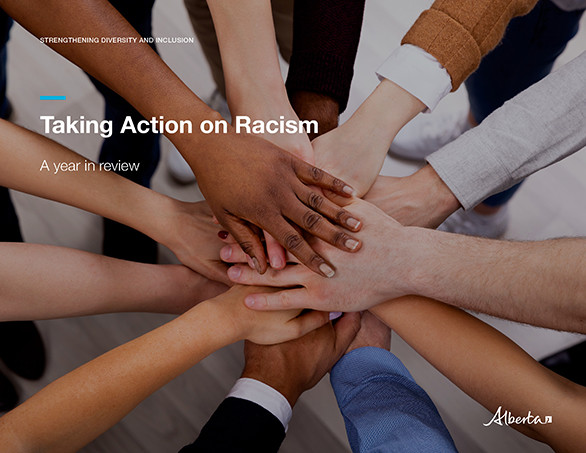Cover image of the Taking Action on Racism - a year in review report, many hands stacked together.