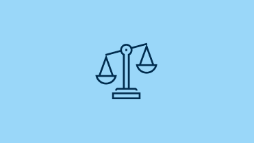 Icon of a balance scale with two pans on a central beam.
