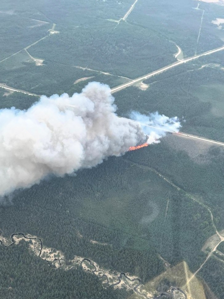 Smoke and flame from a wildfire.