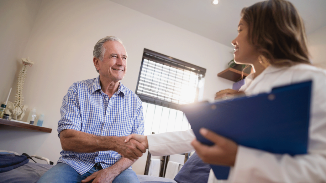 Photo of a doctor and patient shaking hands