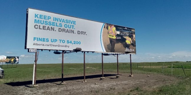 Billboards are now being displayed near many inspection stations to stop invasive mussels