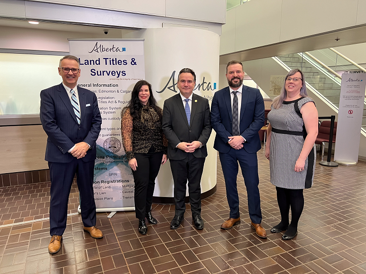 Minister of Service Alberta and Red Tape Reduction Dale Nally poses for a photo alongside industry leaders.