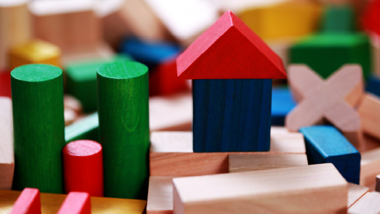 Close up of coloured wooden building blocks