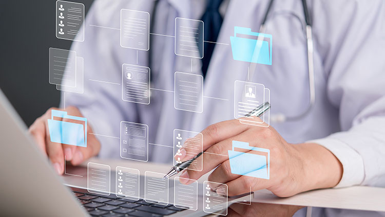 Scientist works on a computer collecting and organizing data.