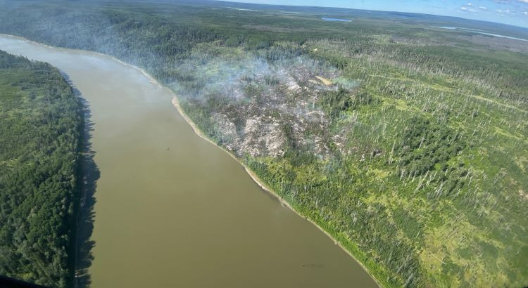 Photo of LWF131 of fire activity along the Athabasca River, taken on July 10, 2025