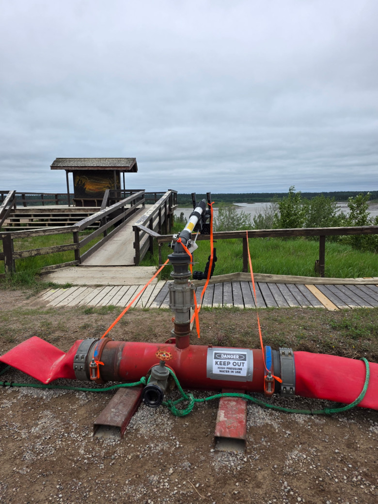 Photo of sprinkler system installed at key areas as a precaution for the Tulip Lake wildfire, June 7, 2025.