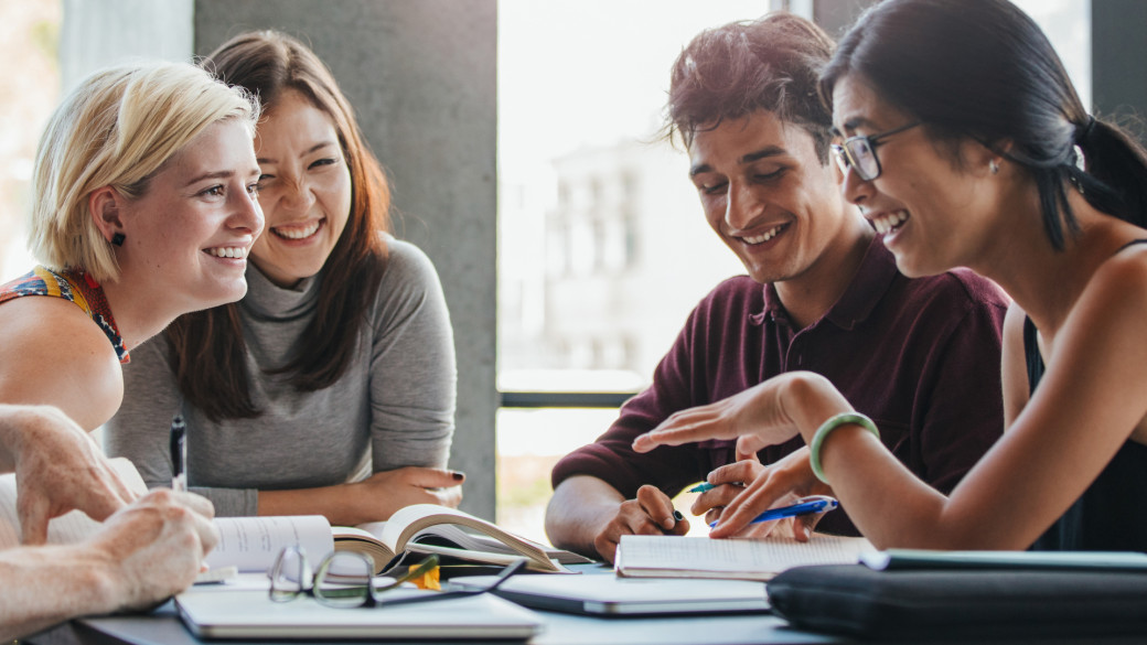 International post-secondary students studying together