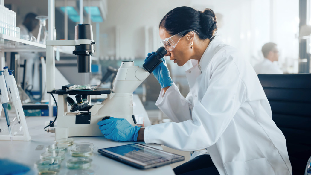 Researchers using laboratory equipment