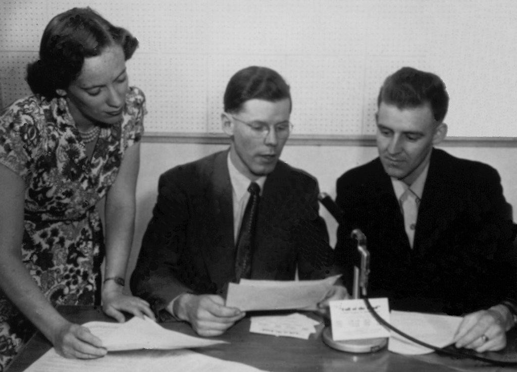 Photo of 3 people doing a radio broadcast