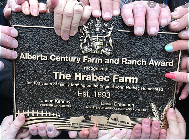 Photo of the Hrabec Farm's Alberta Century Farm and Ranch Award plaque