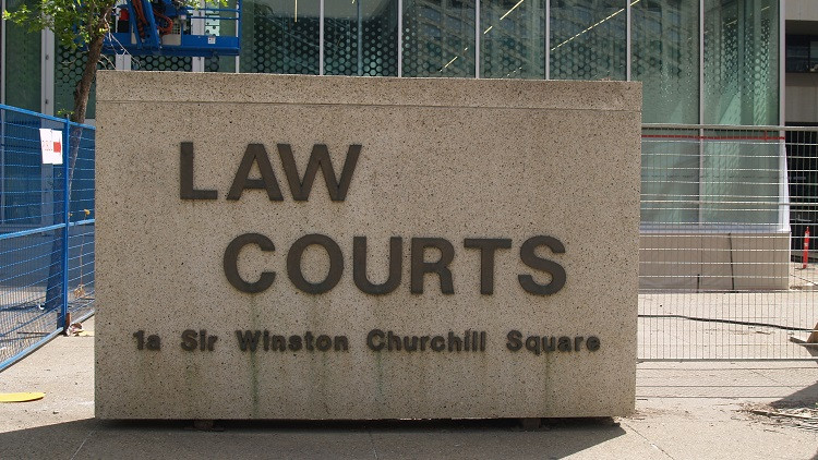 Law courts sign outside of Edmonton Law courts building