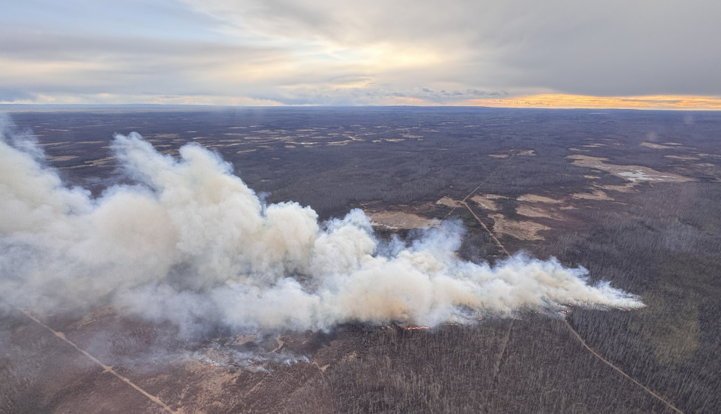 Smoke rises from HWF020 (05052025), SW of High Level