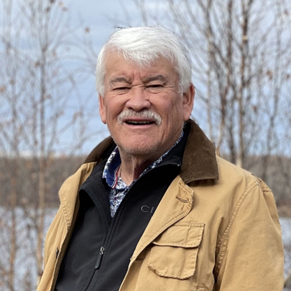 A head and shoulders shot of Elder Dr. Elmer Ghostkeeper, an Elder and Council member of the Buffalo Lake Metis Settlement who serves on the Indigenous Wisdom Advisory Panel in Alberta. 