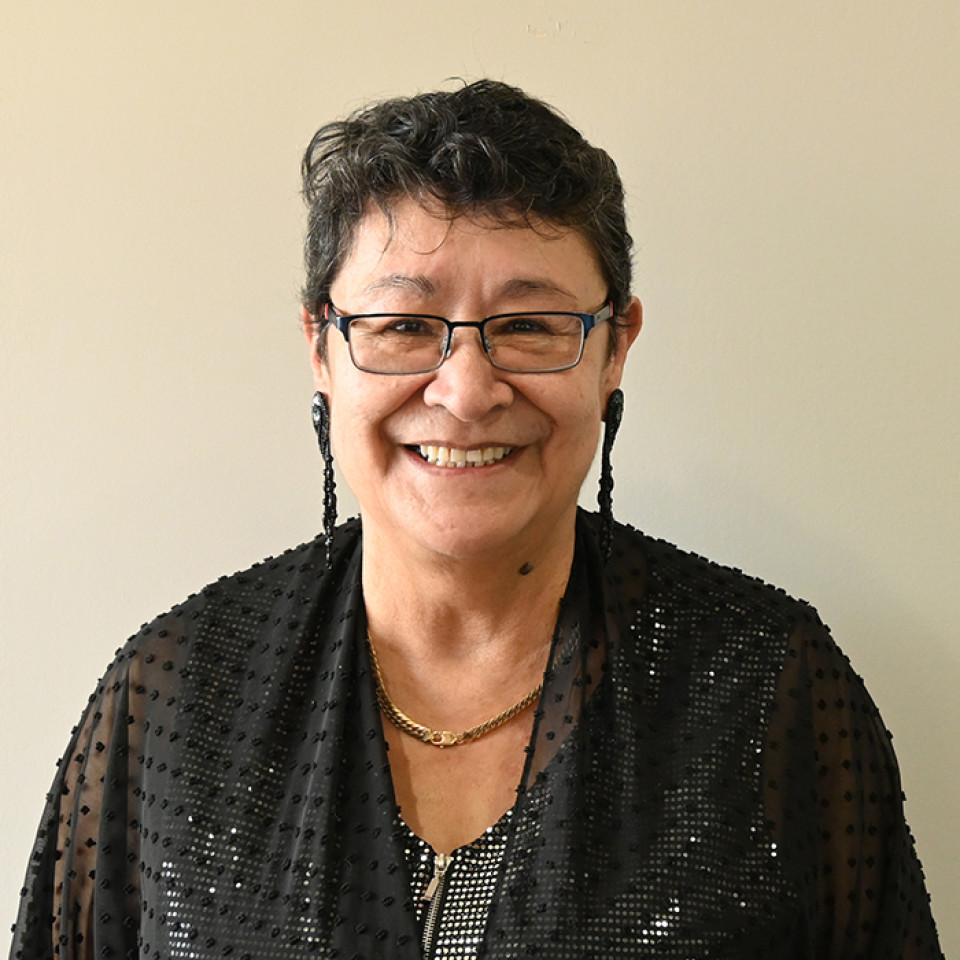 A head and shoulders shot of Elder Lorraine Corrigan, a Fort McMurray Métis Elder who serves on the Indigenous Wisdom Advisory Panel in Alberta. 