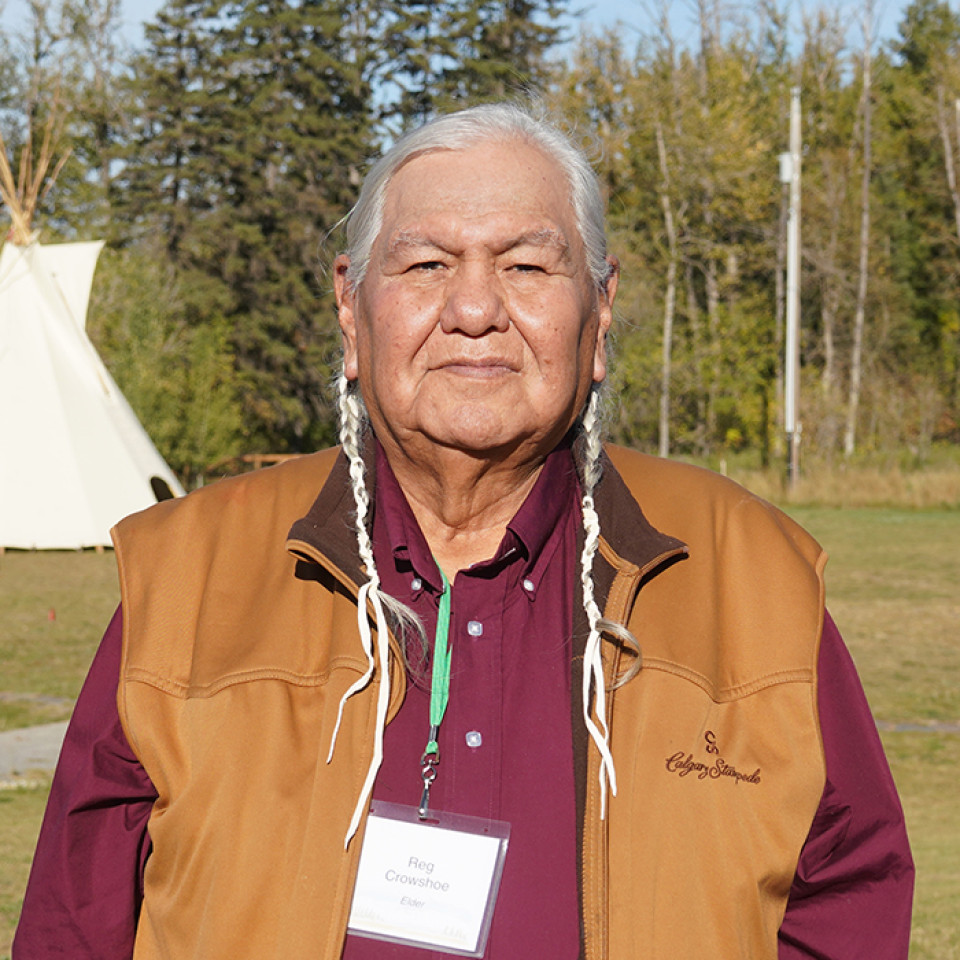 A head and shoulders shot of Elder Dr. Reg Crowshoe, an Elder of the Piikani First Nation who serves on the Indigenous Wisdom Advisory Panel in Alberta. 