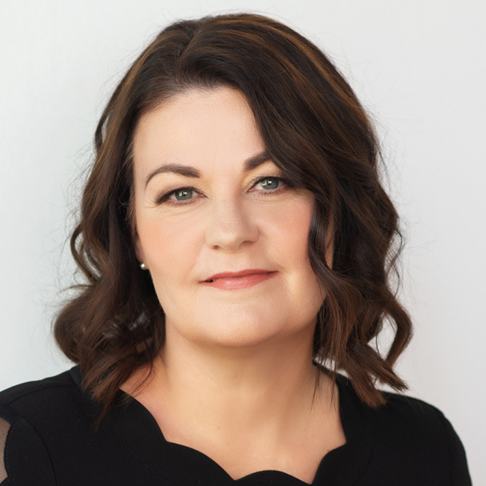 A head and shoulders portrait of Dr. Irena Creed, Ph.D., a member of Alberta's Science Advisory Panel.